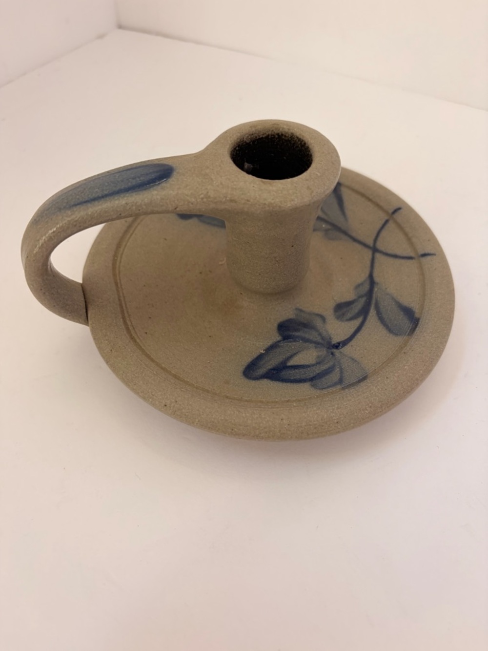 Handcrafted Beige Ceramic Candle Holder with Blue Floral Accent